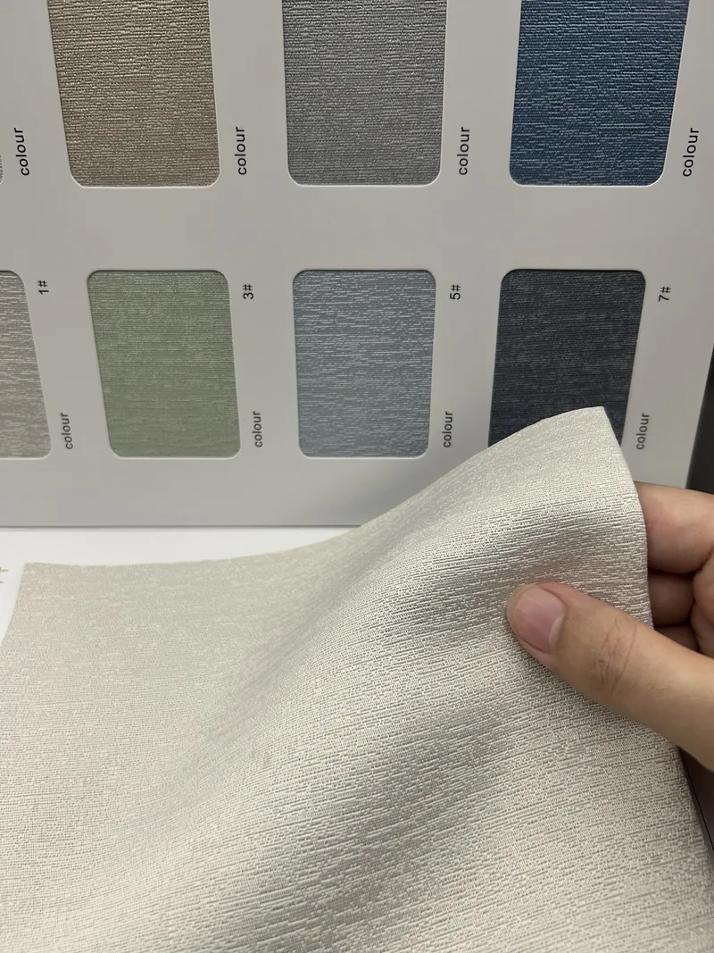 Hand selecting bag fabric from a colour swatch board — custom packaging material options