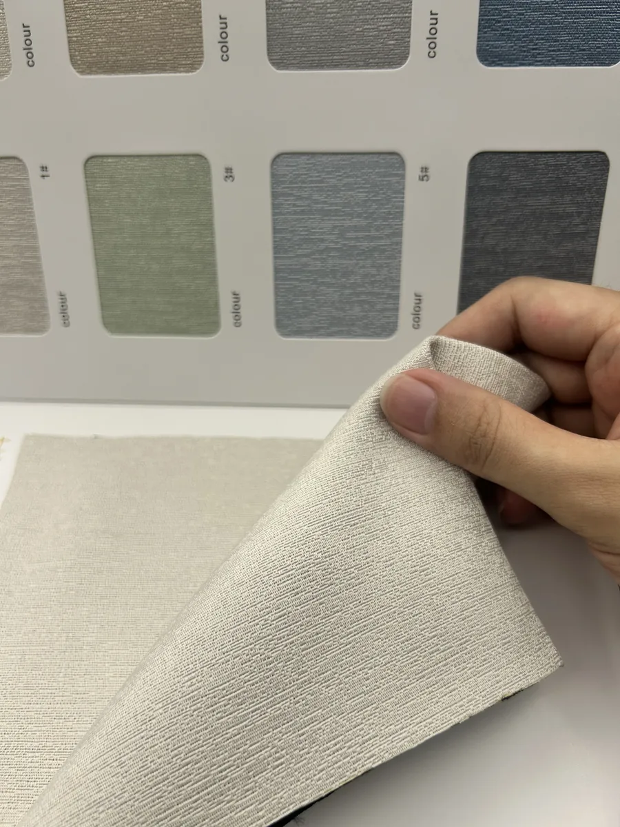 Linen-look woven fabric swatch held against a colour selection board