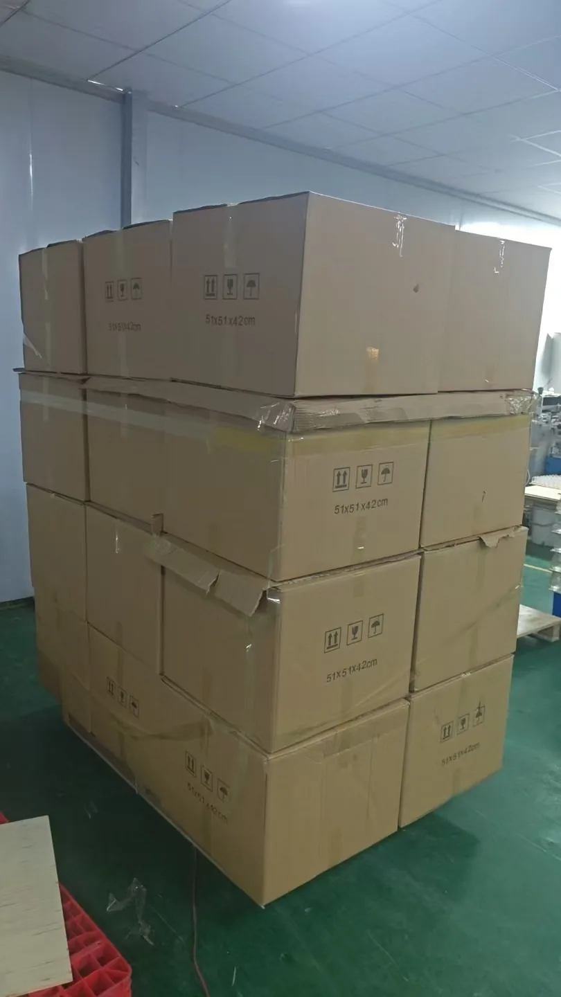 Master cartons of a private-label oil bottle order stacked and ready for export